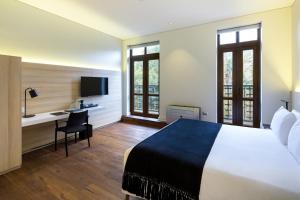 Postel nebo postele na pokoji v ubytování Hotel Altiplanico Bellas Artes