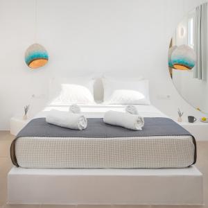 Letto o letti in una camera di VOCA HOTEL & SUITES