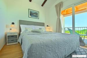 Postel nebo postele na pokoji v ubytování Vespera