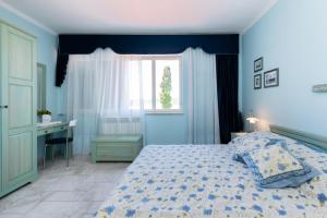 Ένα ή περισσότερα κρεβάτια σε δωμάτιο στο Apartments Rada i Stanislav
