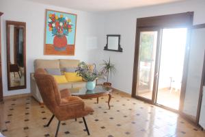 Posedenie v ubytovaní Casa Indalina apartamento con parking privado incluido