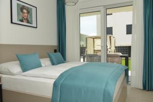 Ένα ή περισσότερα κρεβάτια σε δωμάτιο στο Apartment MI Čiovo with private HOT TUB and garden +59 φωτογραφίες
