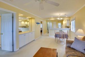 a living room with a couch and a table at Water-View Haven about 6 Mi to Myrtle Beach! in Little River