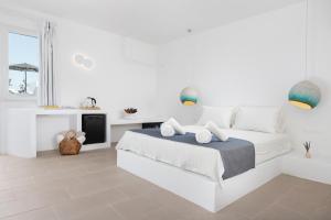 Letto o letti in una camera di VOCA HOTEL & SUITES