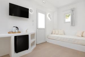 TV o dispositivi per l'intrattenimento presso VOCA HOTEL & SUITES