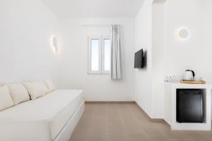 TV o dispositivi per l'intrattenimento presso VOCA HOTEL & SUITES