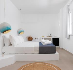 Letto o letti in una camera di VOCA HOTEL & SUITES