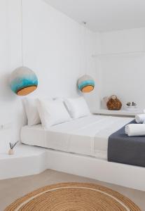 Letto o letti in una camera di VOCA HOTEL & SUITES