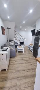 TV a/nebo společenská místnost v ubytování Apartamentos Les Texuques