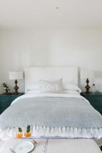 Ліжко або ліжка в номері The Wayback Boutique Hotel