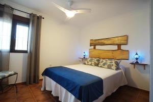Posteľ alebo postele v izbe v ubytovaní Casa PauMar, tu casa en Arcos de la Frontera