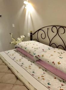 Postel nebo postele na pokoji v ubytování La Casa di Stefania LOFT