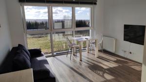 Μια τηλεόραση ή/και κέντρο ψυχαγωγίας στο Apartament Bajkowy