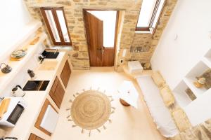 an attic conversion of a house with a living room at Nature Friendly Dame in Mési