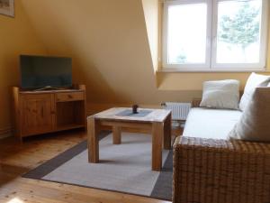 TV a/nebo společenská místnost v ubytování Ferienwohnung im Ostseebad Schönberg nahe Schönberger Strand Ostsee Self-Check-in