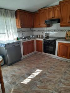 A kitchen or kitchenette at Apartamento O CASAL