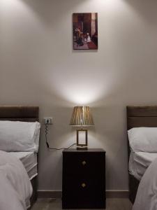 Postel nebo postele na pokoji v ubytování King hur pyramids inn