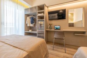 TV a/nebo společenská místnost v ubytování Hotel Cavour