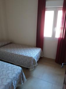 Posteľ alebo postele v izbe v ubytovaní Casa La Tahona