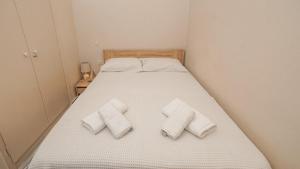 Postel nebo postele na pokoji v ubytování Traditional Dame