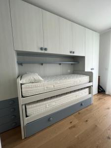 Postel nebo postele na pokoji v ubytování Sirio 7