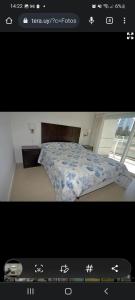 a screen shot of a bedroom with a bed at Apartamento in Punta del Este