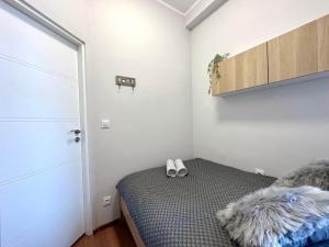 Postel nebo postele na pokoji v ubytování MMRent Oak Room