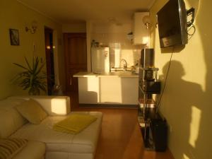 TV a/nebo společenská místnost v ubytování Departamento Frente al Mar