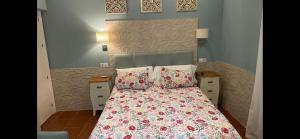 Posteľ alebo postele v izbe v ubytovaní Hostal El Puerto Boutique + 37 fotografií