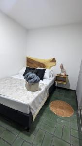 Postel nebo postele na pokoji v ubytování UKU INN