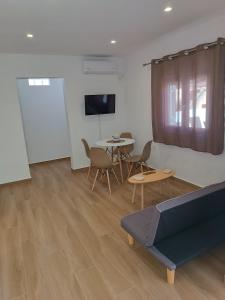 TV a/nebo společenská místnost v ubytování Selinia Residence + 10 fotografií
