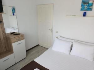 Postel nebo postele na pokoji v ubytování CASA A