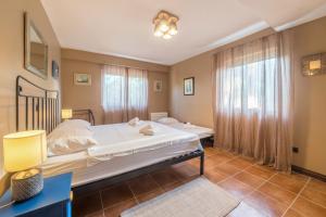 Postel nebo postele na pokoji v ubytování Apartment Yelica + 37 fotografií