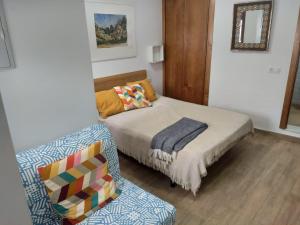 Postel nebo postele na pokoji v ubytování Estudio en el centro de Conil