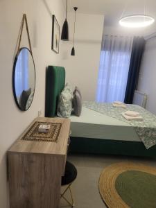 Ένα ή περισσότερα κρεβάτια σε δωμάτιο στο Apartments & Studio Haxhibeti