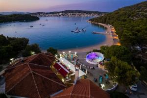 a view of a body of water with a beach at Naomi Amelie in Jezera