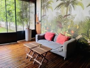 a living room with a couch and a coffee table at Hangar 336 in Menen