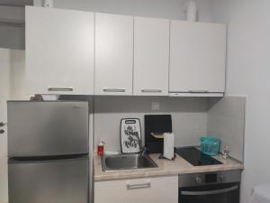 Kuchyň nebo kuchyňský kout v ubytování M2 - Maraki Apartments