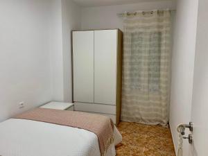 Postel nebo postele na pokoji v ubytování Apartamentos custodio