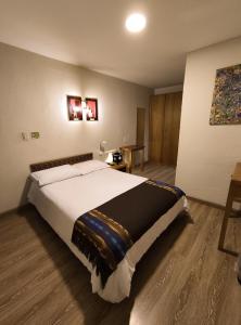Postel nebo postele na pokoji v ubytování Komodo B&B + 9 fotografií