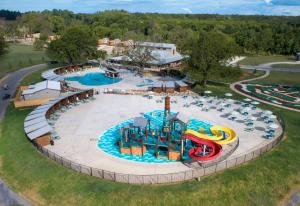 an aerial view of a water park at Camp Fimfo Waco in Waco
