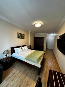 Postel nebo postele na pokoji v ubytování Hotel Brighton