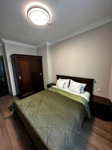 Postel nebo postele na pokoji v ubytování Hotel Brighton