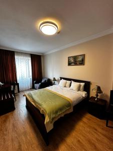 Postel nebo postele na pokoji v ubytování Hotel Brighton