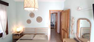 A bed or beds in a room at Nostra Casa di Hovolo