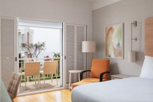 Cama ou camas em um quarto em Doria Hotel Bodrum-City Center