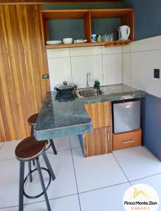 Kuhinja oz. manjša kuhinja v nastanitvi Cabaña Montezion Bijagua
