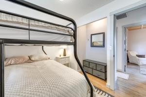 a bedroom with a bunk bed and a mirror at Family-Friendly Lander Home Rental Yard, Patio! in Lander
