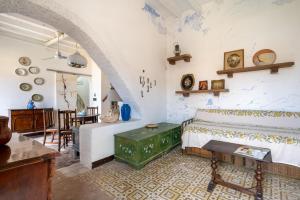 Un pat sau paturi într-o cameră la Casa San Bartolo
