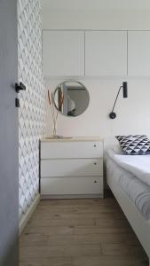 Postel nebo postele na pokoji v ubytování Apartament Sereno, Parking Gratis, Brak Kaucji